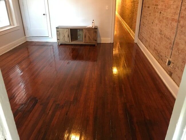 Living room. (TV can be removed upon tenants request prior to moving in or included for free).