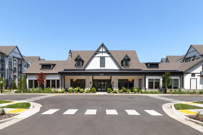 Harpeth Heights Leasing Center with Classic Architecture and Lush Landscaping - Harpeth Heights Apartments