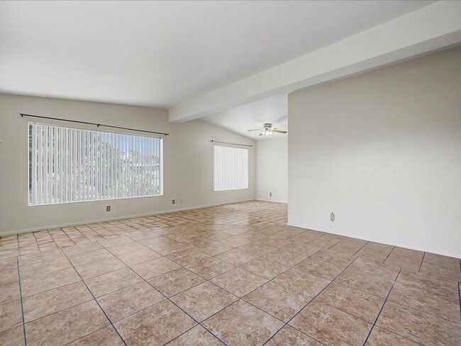 Photo - Charming 3-Bedroom Home with Spacious Yard & Versatile Storage!