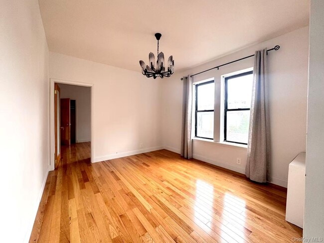 Building Photo - 40-12 73rd St Unit B3