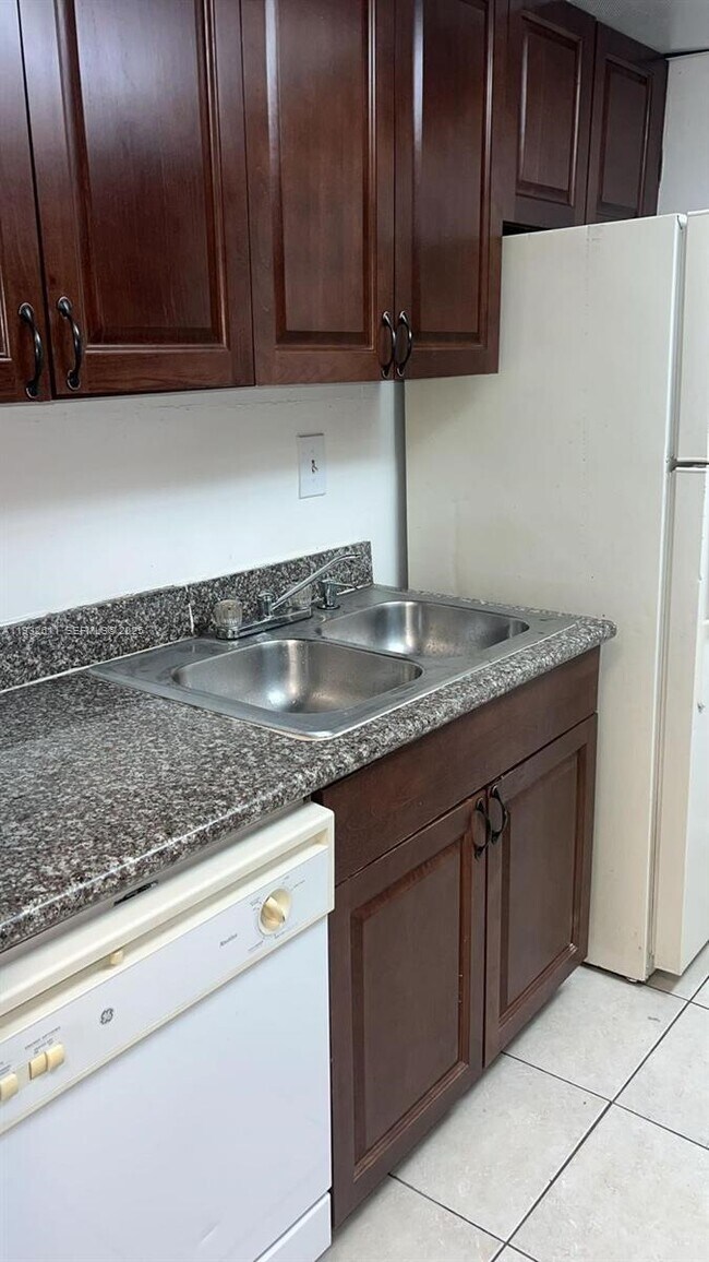 Building Photo - 1880 N Congress Ave Unit 105