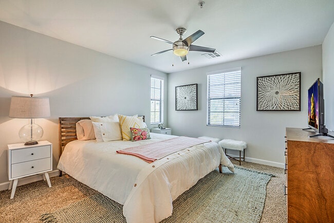 Step into comfort at The Michael B: Freshly painted walls, updated carpet, and a soothing ceiling fan make every moment serene.