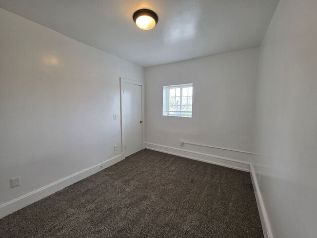 Photo - Modern 2-Bedroom Upper-Level Gem