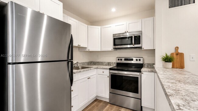 Building Photo - 6445 NW 2nd Pl Unit 2