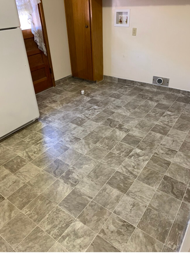 New kitchen floor - 4605 Otis St Unit B