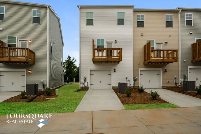 Photo - Modern 3-Story Townhome with First-Level Bedroom, Open Floor Plan & Community Pool – Prime RTP Lo...