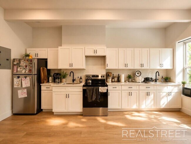 Photo - Top Floor 2 Bed in Renovated Brownstone with Washer/Dryer, Split AC & Tall Ceilings Unit 3