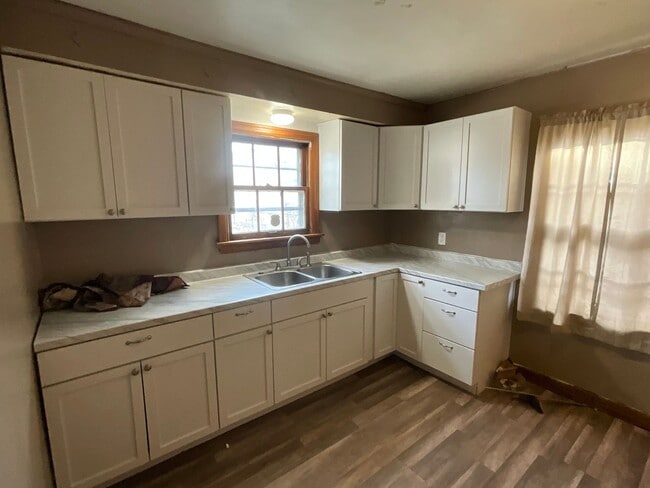 Photo - Charming Three-Bedroom Single-Family Home with Ongoing Updates