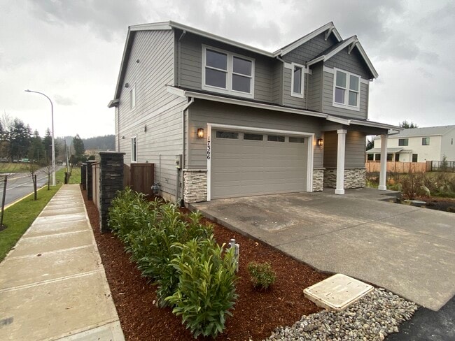 Front of Home with sidewalk view - 17366 SE Hemrich Rd