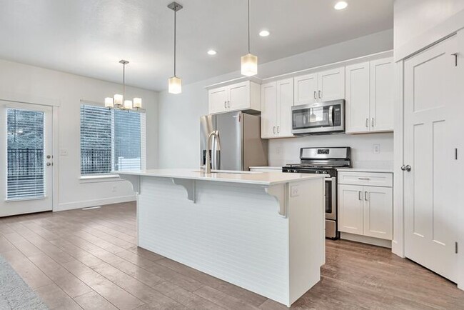 Photo - ROW END TOWNHOUSE W 2 CAR GARAGE + AMENITIES