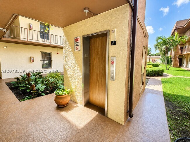 Photo - 10850 W Flagler St