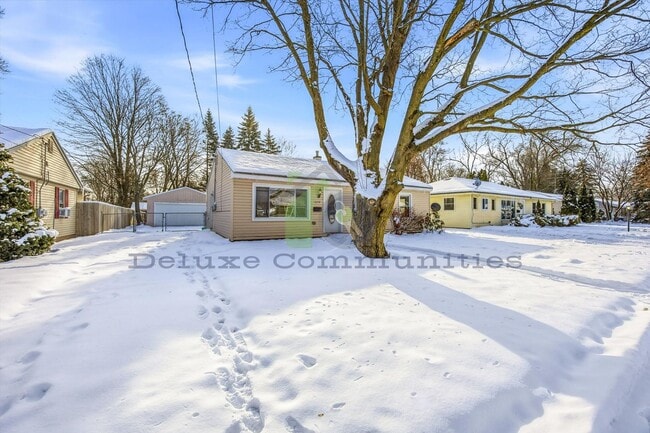 Photo - Spacious 3 Bedroom Single Family Home Near Downtown GR | $1795