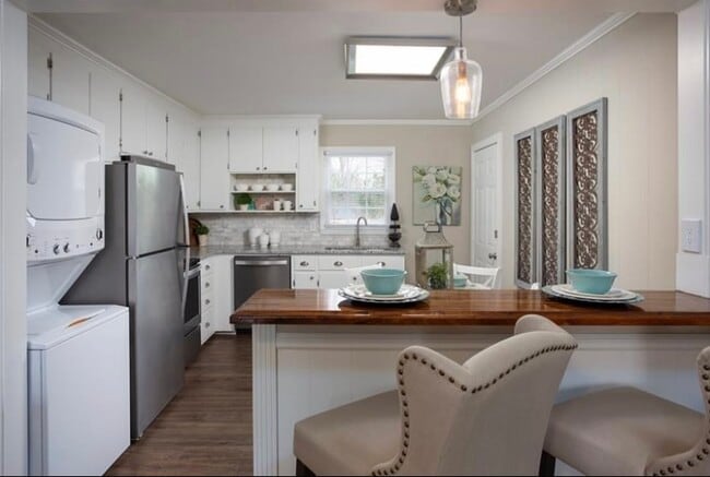 309-311 W 3rd Ave
