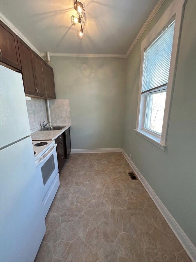 Photo - Cozy Main Floor 1 Bedroom with Private Entrance and Parking Unit 4