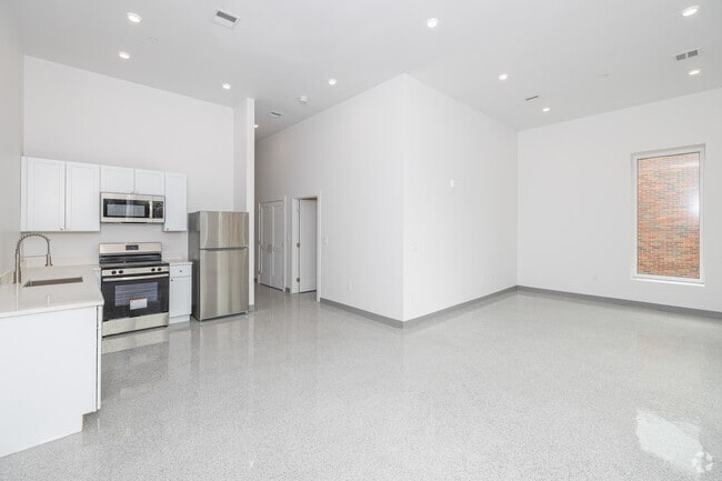 2BR, 2BA - 925SF - Kitchen & Living Room