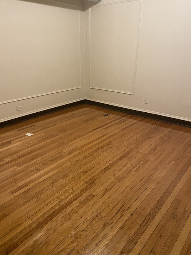 Building Photo - 7852 S Colfax Ave Unit 201