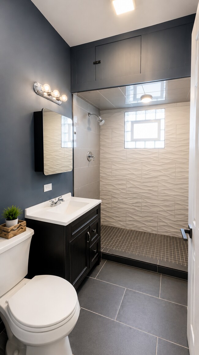 Updated Full bathroom - 2405 N Neva Ave Unit Loft Style Ground