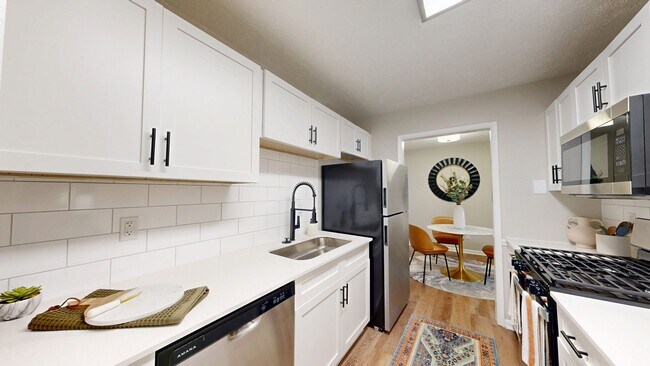Newly Renovated Kitchen with Quartz Countertops - Rosemont at East Cobb Apartments