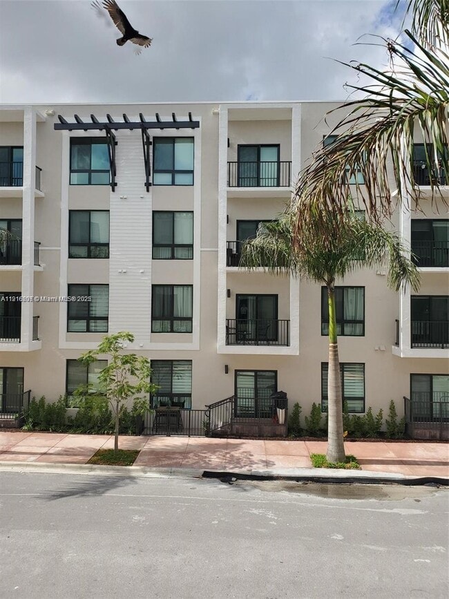 Building Photo - 8265 NW 41st St Unit C-203