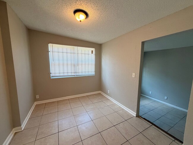 Spacious, updated 3/1 with bonus room and large utility room