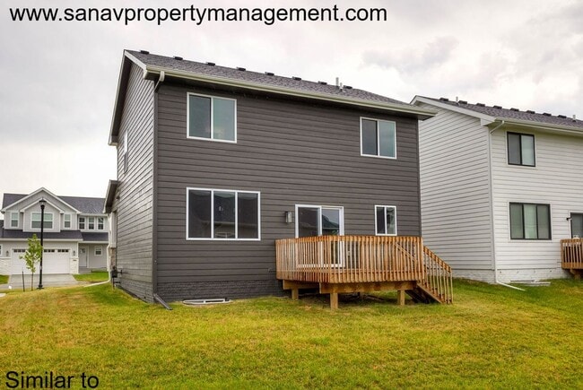 Photo - Like-New 4-Bedroom Home in Heritage Park –...