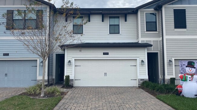 Building Photo - 3 Bedroom, 2.5 Bath Townhome in Lake Nona - Priced to Rent!