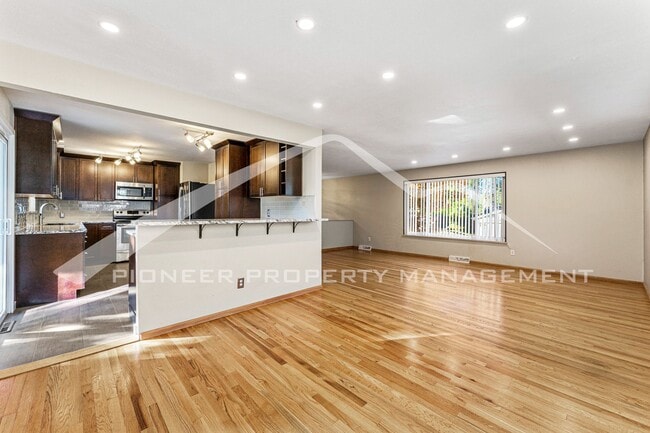 Photo - Spacious Home with Natural Light & Fenced Backyard