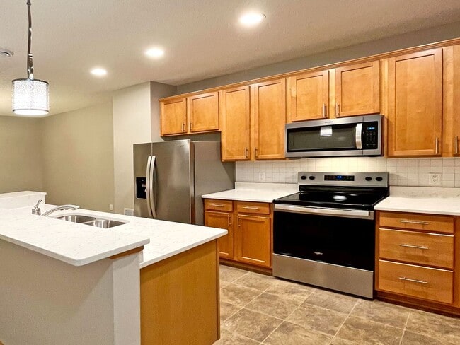 Photo - Upscale Townhome with Large Office-Loft, 3 Baths, 2-Car Attached Garage, Quartz Countertops and M...