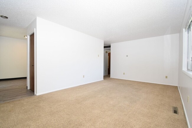 Photo - Spacious and charming! Conveniently located top floor 2 bedroom apartment. Unit A