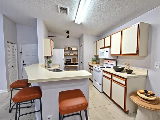 Photo - 9999 Summerbreeze Dr Unidad 102