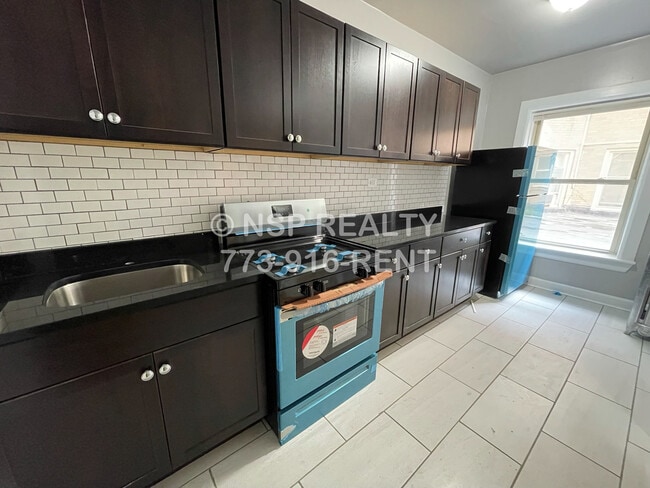 Building Photo - 6347 N Magnolia Ave Unit 2M Rental