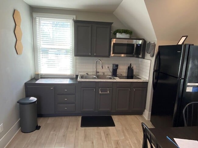 Photo - Charming 1-Bedroom Apartment Over Garage f...