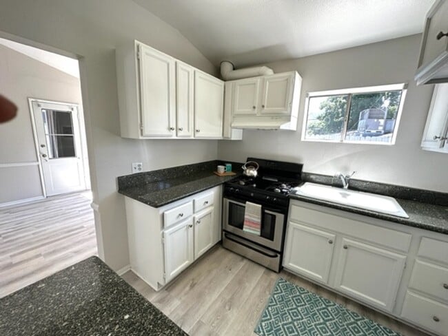 Photo - 2+1 Bungalow Cottage- central a/c, carport, patio, washer/dryer hookups, pet friendly