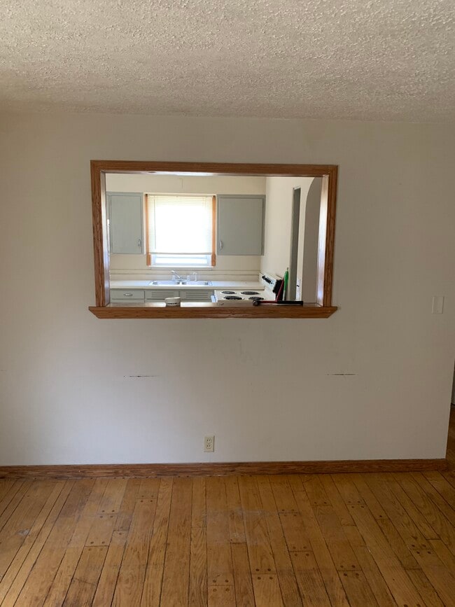 Living room into kitchen view