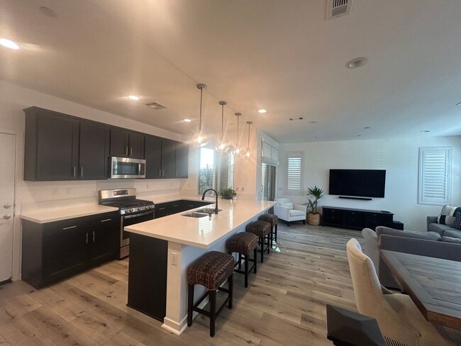 Photo - Modern 4 Bedroom Home with Downstairs Suite, Owned Solar & Resort-Style HOA Amenities