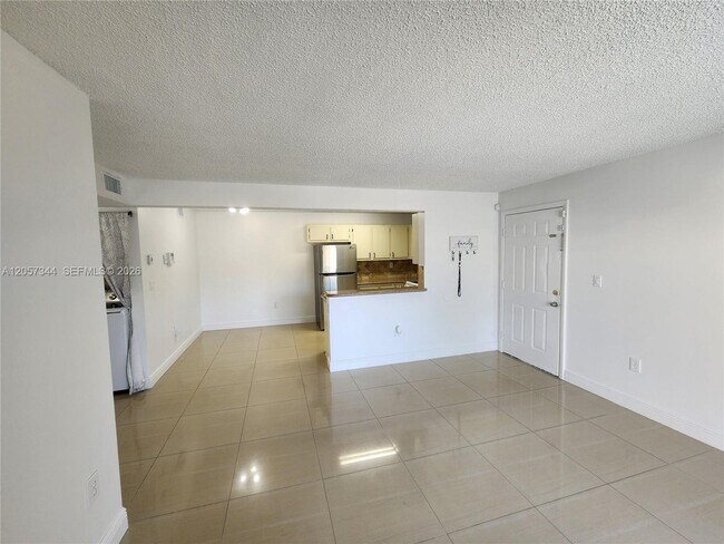 Photo - 9491 Palm Cir S Unit 205