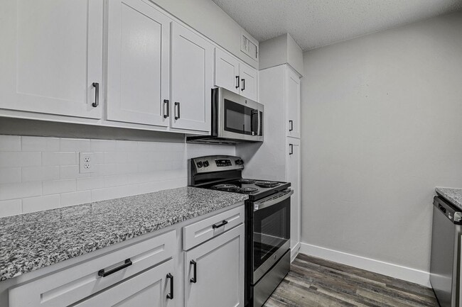 Photo - Flats on Handley:  Pool, BBQ Area, Renovated Units