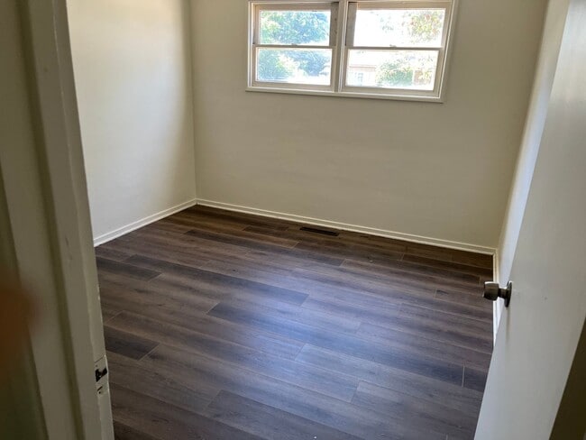 Photo - New flooring, New Paint. Garage & Carport