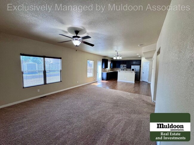 Photo - Spacious 5 Bedroom, 3.5 Bath Home with 3-Car Garage, and Pet-Friendly Living in 80925!