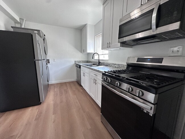 Photo - Newly Remodeled Two-Bedroom Condo! Rent Includes Water, Sewer, Trash, and Internet!