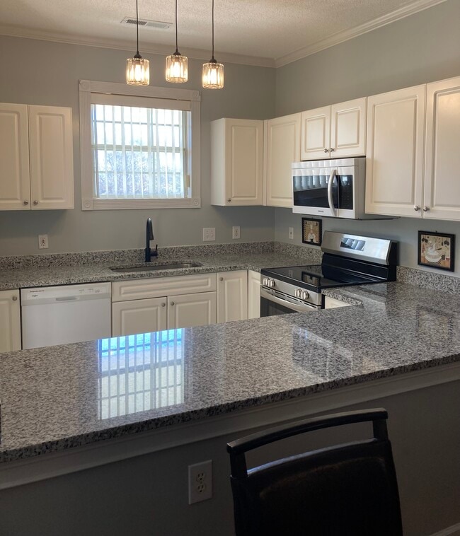 Building Photo - 4241 Hibiscus Dr Unit #6-302