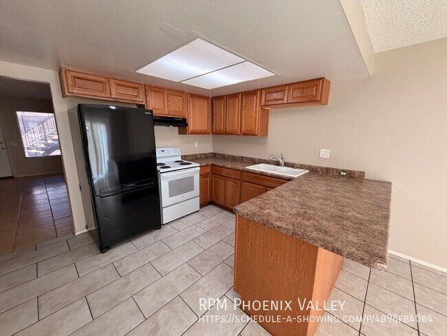 Photo - 4401 N 53rd Ln Unidad 2