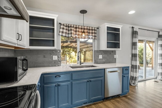 Photo - Exquisite 4 Bed, 2.5 Bath Redmond Retreat: Endless Backyard Amenities, Farmhouse Upgrades, and Tr...