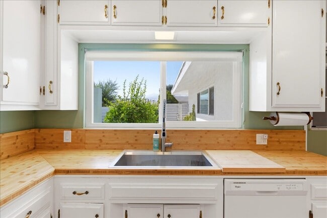 Photo - 3 bed / 2 Bath Mid-Century Home with Two-Car Garage, Soaking Pool and Manicured Backyard!