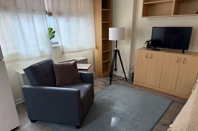 living area (TV + wifi + streaming included) - 1420 N St NW Unit #610