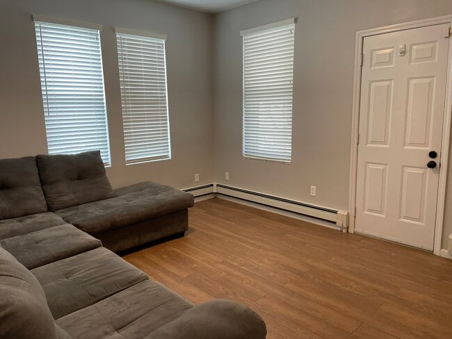 Building Photo - 684 85th St Unit 3