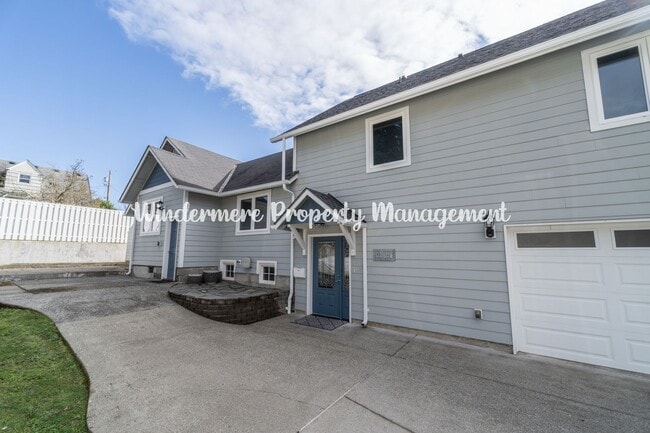 Photo - Beautifully Remodeled 2 bedroom in convenient location, private balcony, over sized garage, A/C a...