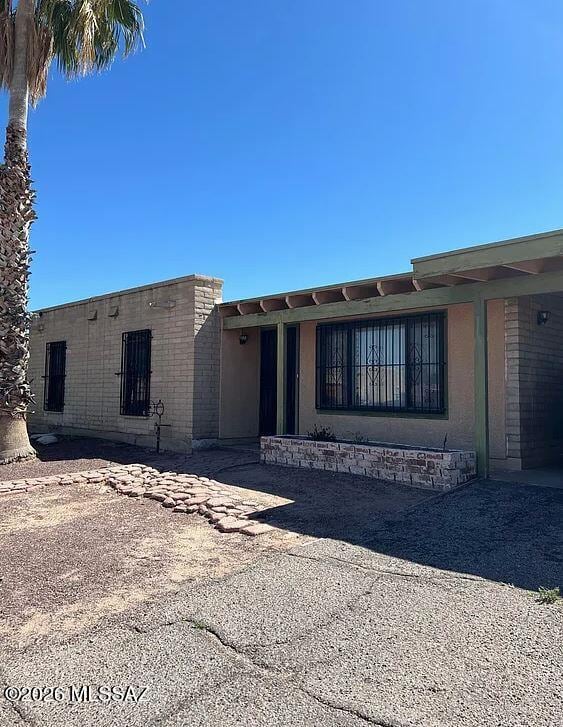 Building Photo - 6027 S Lostan Ave
