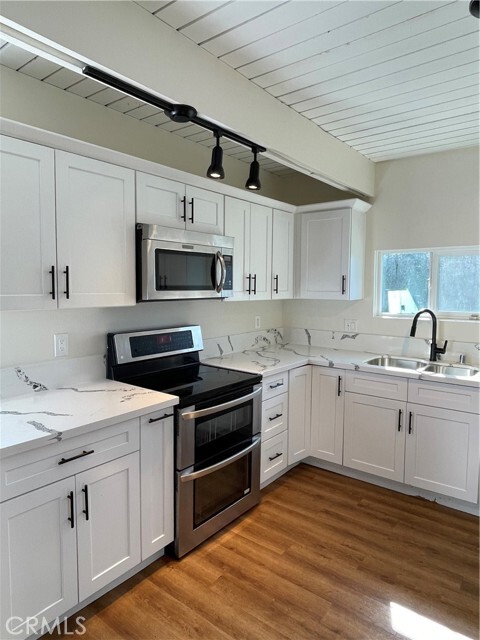 Photo - 11571 Archwood St Townhome