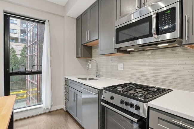 Photo - Modern 1BR Condo Steps to Metro, Parks & New Rec Center!